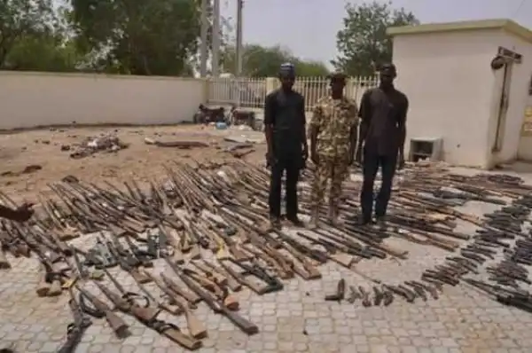 OMG!!! Repentant Bandits In Zamfara Surrender Dangerous Guns To The Soldiers In the State (PHOTO)